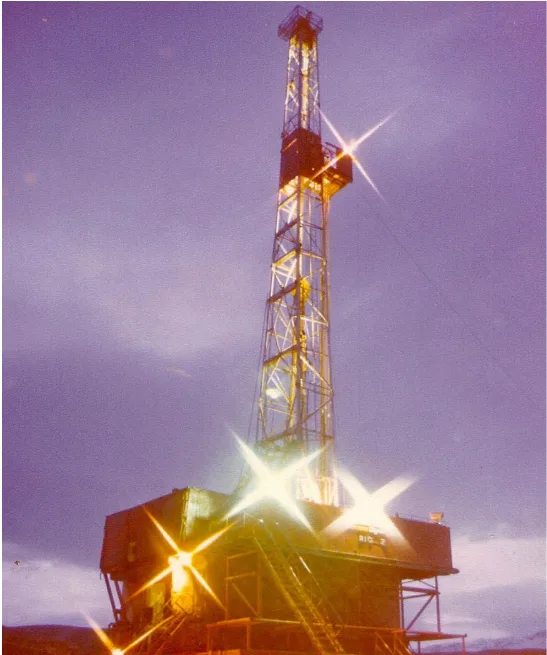 Drilling rig at Tuscarora lit up at dusk